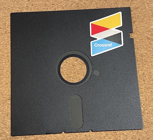 5Â¼ inch floppy disk with Crossref logo