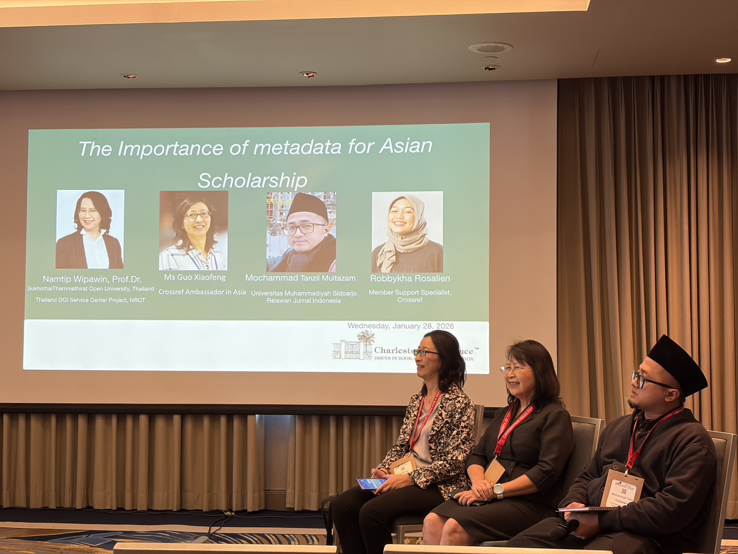 Ms. Guo Xiaofeng, Prof. Dr. Namtip Wipawin, and Mochammad Tanzil Multazam on the stage during their panel session